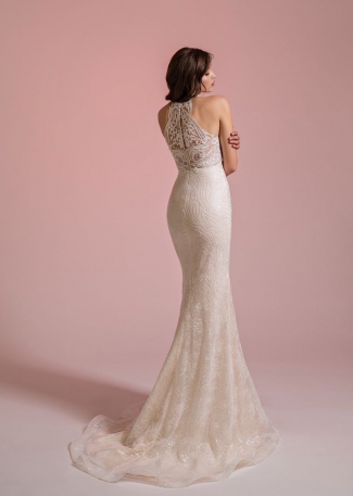 Plecy sukni ślubnej pokryte koronkowym ornamentem Plecy sukni ślubnej pokryte koronkowym ornamentem