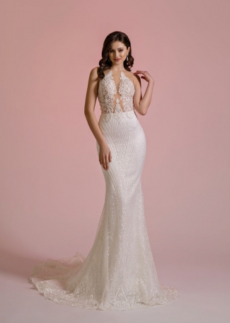 Suknia ślubna typu syrena z efektowną koronkową górą. Całość obszyta cekinami. Suknia ślubna typu syrena z efektowną koronkową górą. Całość obszyta cekinami.