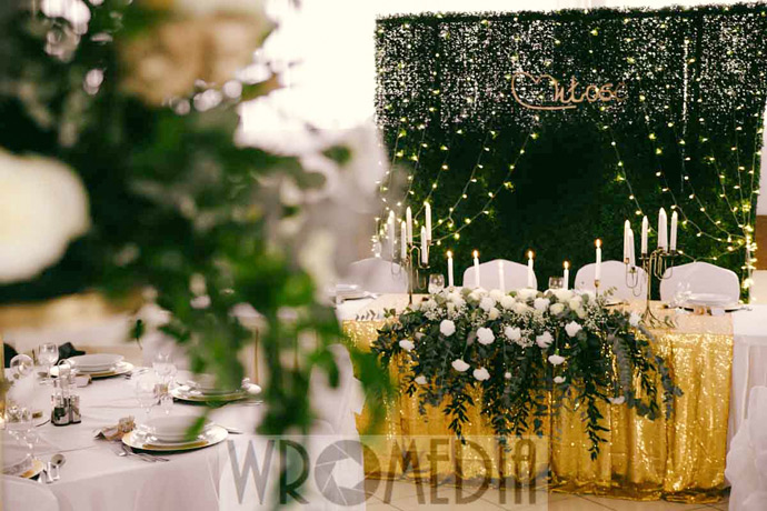 Elegancka dekoracja weselna zielono złota